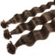 Extensions à chaud châtain noisette cheveux frisés 50 cm