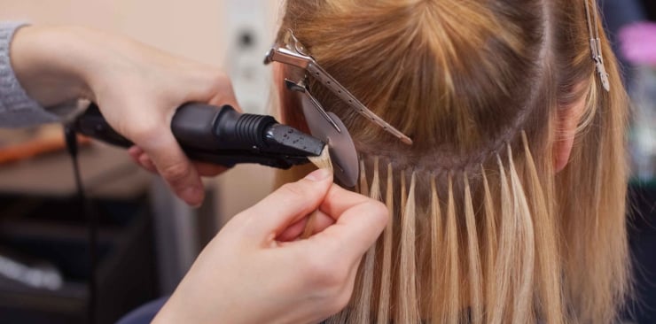 Quelle est la meilleure technique de pose d’extensions de cheveux ? - elite extensions